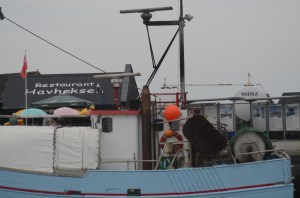 Note the tank behind the fishing boat