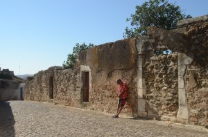 Old streets and I'm looking at my feet which are hot